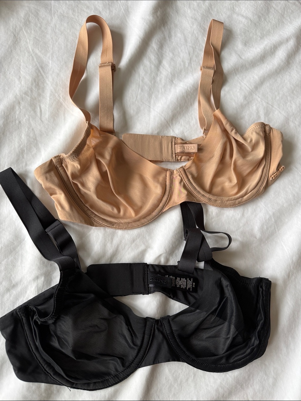 SKIMS Two-Pack Underwire Bras in Nude and Black